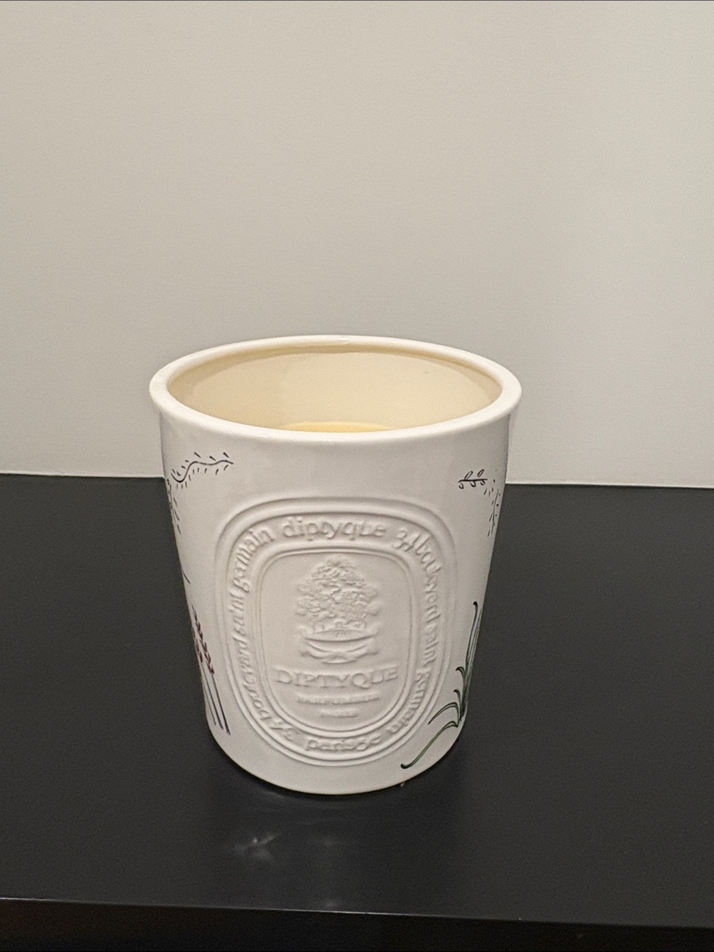 diptyque White Embossed Ceramic Candle Holder with Subtle Floral Accents